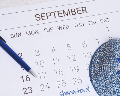 September calendar with "Rosh Hashana" text Calendar with kippah. September calendar with "Rosh Hashana" text. Jewish new year concept.
